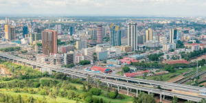 Read more about the article Buy Land in Kenya: Satellite Towns vs. Nairobi Compared for 2026